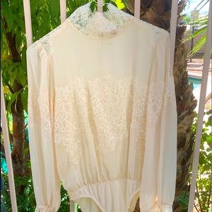 Beautiful vintage cream body suit